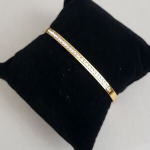 Elegant Gold Tone and Crystal Like Detail Bracelet